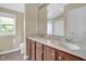Bright bathroom with double sinks and neutral color walls at 503 Bellefont Ct, Knightdale, NC 27545