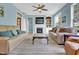 Inviting living room with a fireplace, built-in shelves, and plenty of natural light, perfect for relaxation at 503 Bellefont Ct, Knightdale, NC 27545