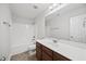 Bathroom with single sink vanity, tiled flooring, and a shower-tub combo at 503 Mugo Pine Ct, Wendell, NC 27591