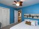 Comfortable bedroom with a ceiling fan, carpeted floors, and ensuite bathroom visible through the doorway at 508 Colony Woods Dr, Chapel Hill, NC 27517