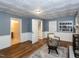 Inviting living room featuring a unique ceiling, fireplace, and access to the basement and other rooms at 508 Colony Woods Dr, Chapel Hill, NC 27517