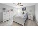 Cozy bedroom with a ceiling fan, window, and light neutral decor at 509 National Dr, Clayton, NC 27520