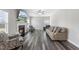 Spacious living room with fireplace, wood flooring, and lots of natural light at 509 National Dr, Clayton, NC 27520