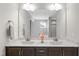 Bright main bathroom featuring double sinks with modern fixtures and plenty of counter space at 509 National Dr, Clayton, NC 27520