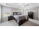 Inviting main bedroom with trey ceilings, neutral tones, and ample natural light at 509 National Dr, Clayton, NC 27520