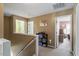 Hallway with carpeted floors and access to bedrooms and bathroom at 5204 Nautical Ln, Raleigh, NC 27610