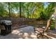 Enjoy outdoor living on this patio, complete with a grill and plenty of space to unwind at 5515 S Roxboro St # 23, Durham, NC 27713