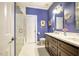 Modern bathroom with double vanity, glass shower, and stylish fixtures at 5515 S Roxboro St # 23, Durham, NC 27713