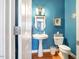 Stylish half-bathroom with a pedestal sink, and tile floor at 5515 S Roxboro St # 23, Durham, NC 27713