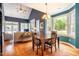 Inviting dining area with large windows and a view of the backyard at 5515 S Roxboro St # 23, Durham, NC 27713
