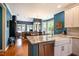Bright kitchen features granite counters, stainless appliances, and an open layout at 5515 S Roxboro St # 23, Durham, NC 27713