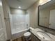 Bright bathroom with single vanity and shower and tub combo at 56 Ruskin Dr, Smithfield, NC 27577