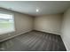 Neutral bedroom with window to backyard at 56 Ruskin Dr, Smithfield, NC 27577