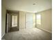 Comfortable bedroom with soft carpeting, a window, and a closet at 56 Ruskin Dr, Smithfield, NC 27577