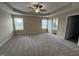 Spacious main bedroom featuring ample natural light and an ensuite bathroom at 56 Ruskin Dr, Smithfield, NC 27577
