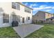 Backyard view of a home featuring a door, patio and grill at 5609 Severn Grove Dr, Durham, NC 27703