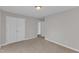 Bedroom with carpet flooring and a doorway to another room at 5609 Severn Grove Dr, Durham, NC 27703