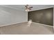 Large bedroom with a neutral color scheme, carpeted floors, and ample natural light at 5609 Severn Grove Dr, Durham, NC 27703