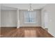 Bright dining area with hardwood floors and a window overlooking the yard at 5609 Severn Grove Dr, Durham, NC 27703
