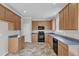 Well-lit kitchen featuring cabinets and appliances at 5609 Severn Grove Dr, Durham, NC 27703