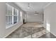 Spacious living room boasts natural light, a fireplace, and an open concept design at 5609 Severn Grove Dr, Durham, NC 27703
