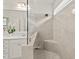Modern bathroom with a walk-in shower, quartz countertops, and a clear glass partition at 563 Great Ridge Parkway, Chapel Hill, NC 27516