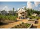 Community garden with raised beds and garden shed at 563 Great Ridge Parkway, Chapel Hill, NC 27516