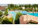 Community pool with area, water slide, and lounge chairs at 563 Great Ridge Parkway, Chapel Hill, NC 27516