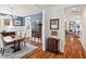 Charming dining room with hardwood floors, wainscoting, and stylish furnishings at 563 Great Ridge Parkway, Chapel Hill, NC 27516