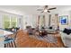 Open concept living area with lots of natural light, hardwood floors, and stylish decor at 563 Great Ridge Parkway, Chapel Hill, NC 27516