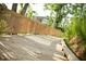 Wooden walkway featuring a railing surrounded by trees and lush greenery enhancing the natural beauty at 563 Great Ridge Parkway, Chapel Hill, NC 27516