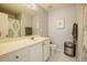 This spacious bathroom features a shower-tub and white vanity at 5710 Corbon Crest Ln, Raleigh, NC 27612