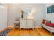 Entryway features hardwood floors, seating, and a white cabinet at 5710 Corbon Crest Ln, Raleigh, NC 27612
