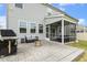 Backyard featuring a screened-in porch, outdoor seating, a grill, and a patio at 575 Dawley Dr, Fuquay Varina, NC 27526