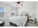 Bedroom featuring a ceiling fan and a large window providing natural light at 575 Dawley Dr, Fuquay Varina, NC 27526