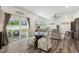Bright living room featuring sliding glass doors to the patio and a comfortable seating area at 575 Dawley Dr, Fuquay Varina, NC 27526