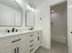 Bathroom showcasing double vanity with modern fixtures at 5817 Wintergreen Dr, Raleigh, NC 27609