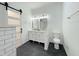 Bathroom featuring modern sink, vanity, and toilet at 5817 Wintergreen Dr, Raleigh, NC 27609