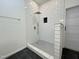 Tiled walk-in shower with modern fixtures and neutral coloring at 5817 Wintergreen Dr, Raleigh, NC 27609