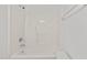 Clean bathroom with white tiled shower and toilet at 620 Hanska Way, Raleigh, NC 27610