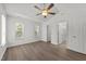 Spacious bedroom features a ceiling fan, and a door to the bathroom at 620 Hanska Way, Raleigh, NC 27610