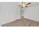 Spacious bedroom features open doorway, neutral walls, and ceiling fan at 620 Hanska Way, Raleigh, NC 27610