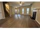Spacious living room featuring hard surface flooring and a fireplace at 620 Hanska Way, Raleigh, NC 27610