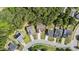 Neighborhood aerial view featuring manicured lawns and tree-lined streets on a sunny day at 633 Prickly Pear Dr, Fuquay Varina, NC 27526