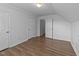 Spacious bedroom with wood-look floors and natural light at 633 Prickly Pear Dr, Fuquay Varina, NC 27526