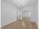 Spacious open-concept living room with wood-look floors at 633 Prickly Pear Dr, Fuquay Varina, NC 27526