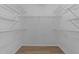 Walk-in closet with multiple shelves for storage at 633 Prickly Pear Dr, Fuquay Varina, NC 27526