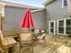 Backyard wooden deck with seating area and partial shade at 6718 Twin Tree Ct, Raleigh, NC 27613