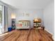 Bright Bedroom with wood floors, a crib, and toy storage at 6718 Twin Tree Ct, Raleigh, NC 27613