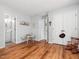 Bright bedroom featuring wood floors, closet, natural light, and neutral walls at 6718 Twin Tree Ct, Raleigh, NC 27613